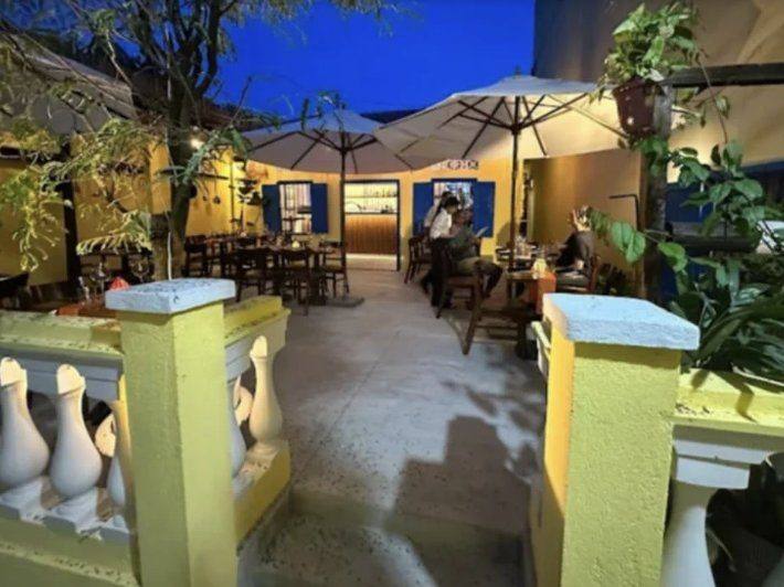 Maison Lucien French bistro courtyard in Hội An Old Town