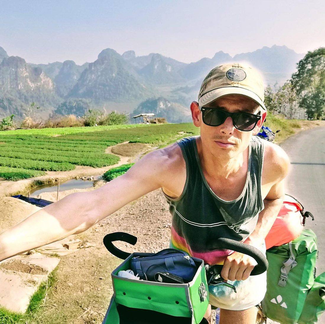 Chef John Gallais cycling through northern Laos mountains 2020 — the journey that led to Hội An