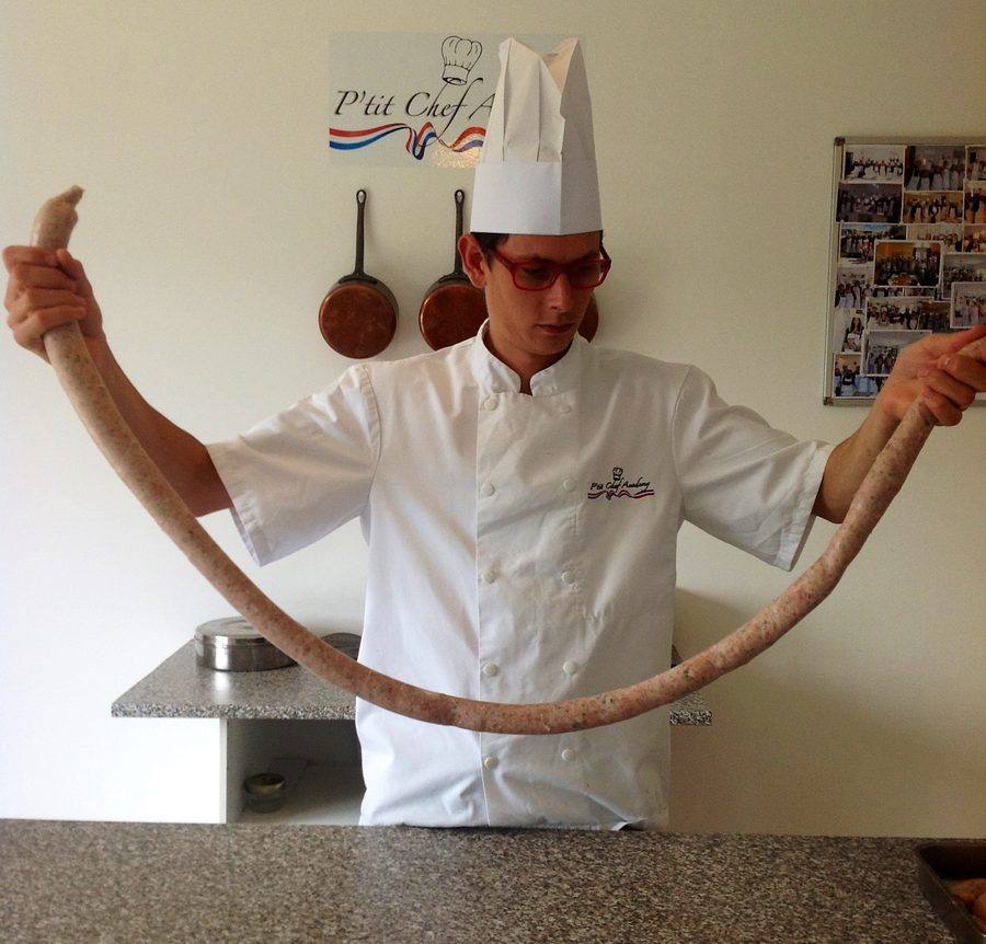Chef John Gallais making artisan saucisson — charcuterie heritage runs in the Gallais family